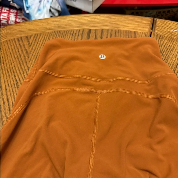 lululemon athletica Burnt Orange Flare Leggings - Picture 5 of 8
